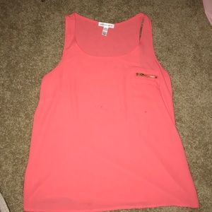 Pink hi-low racerback flowy t-shirt with pocket.